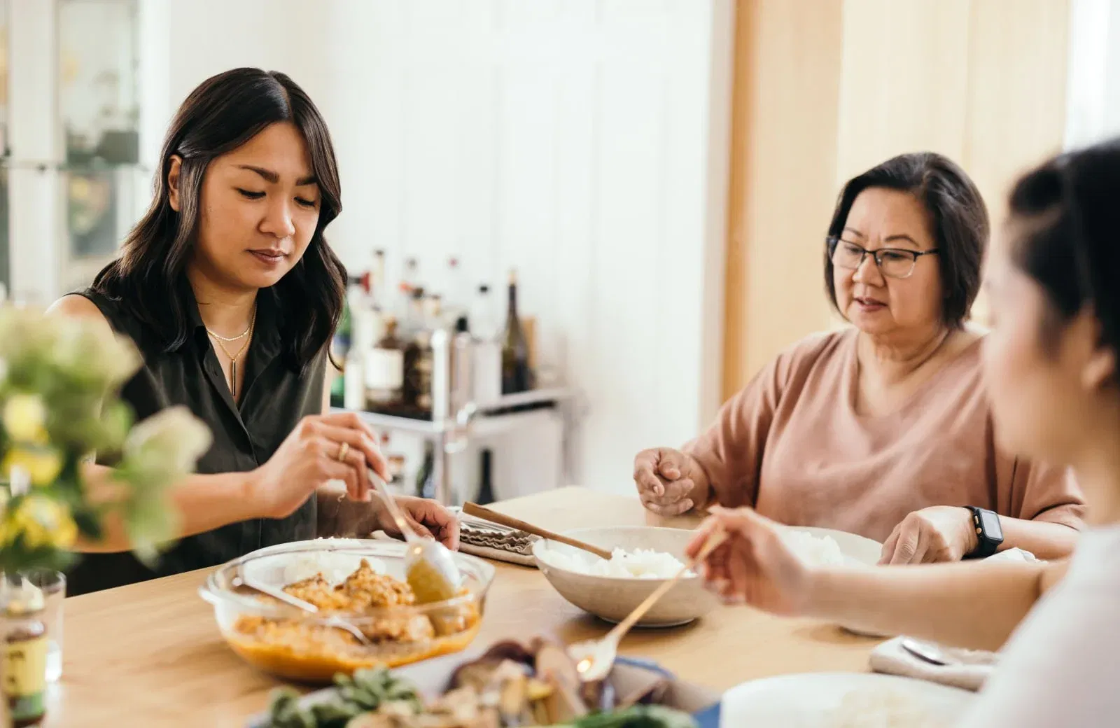 Family enjoying a meal together at home